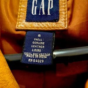 100% Leather Gap camel vintage color trench coat.  Great condition.  Size small.